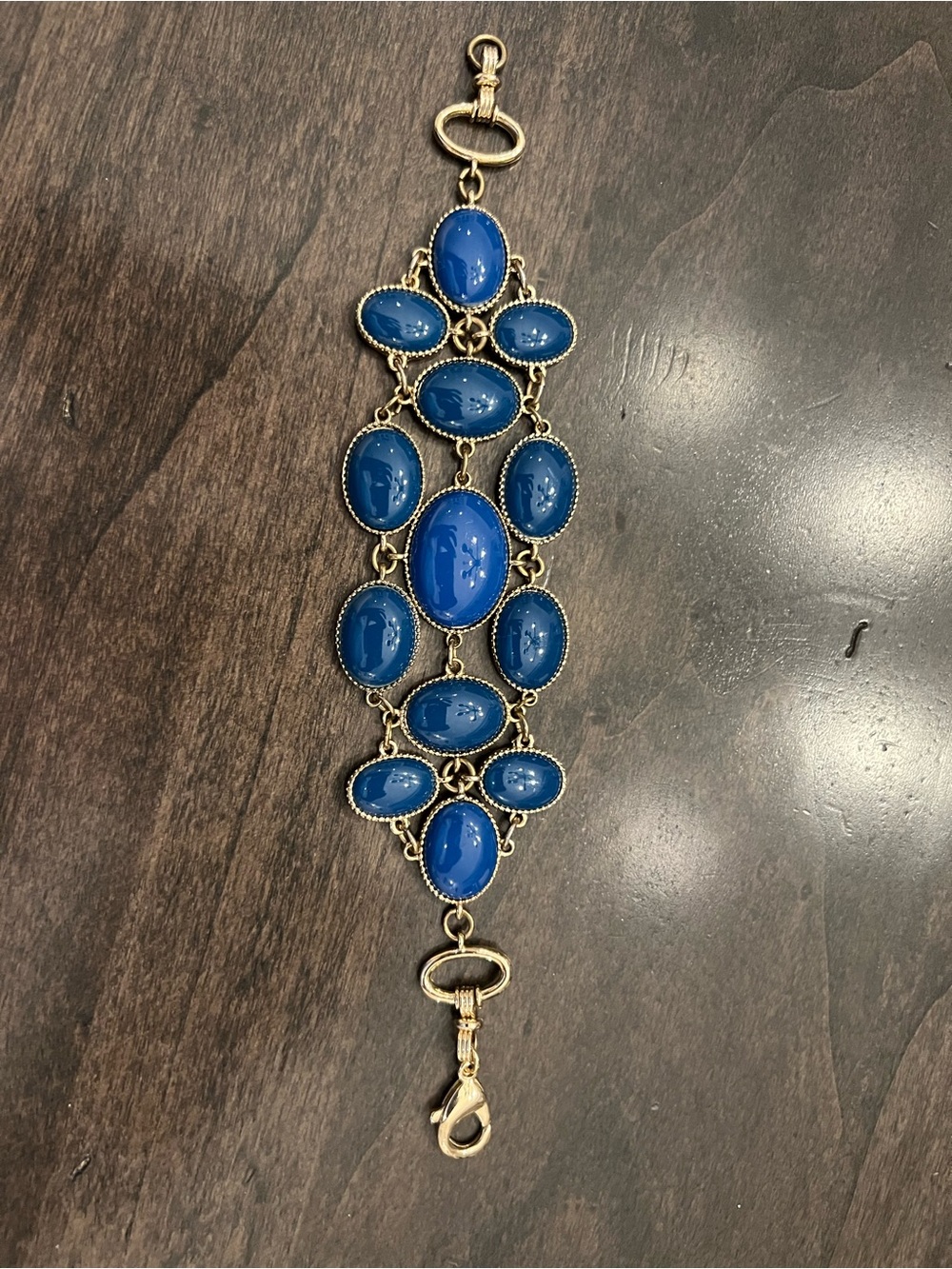 Cache Gold-Tone Bracelet with Royal Blue Cabochons